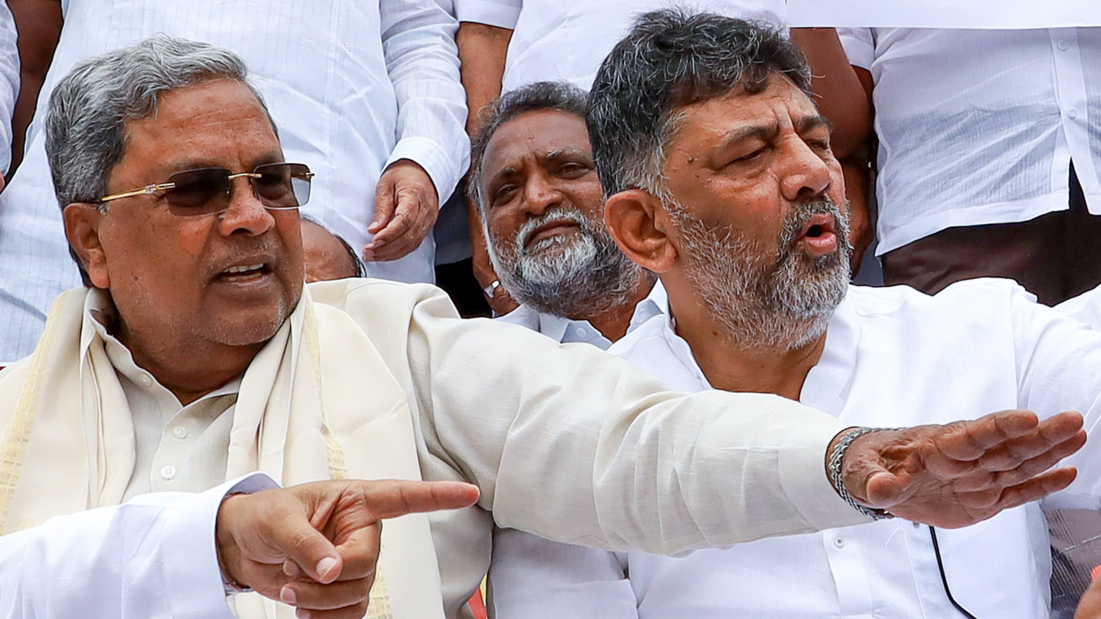 <div class="paragraphs"><p>Karnataka Chief Minister Siddaramaiah and Deputy CM D K Shivakumar  stage a protest against the central government over the sanction granted by Governor Thaawarchand Gehlot  in Bengaluru, Saturday,</p></div>